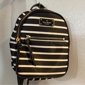 Kate Spade mini backpack, Black and white striped.